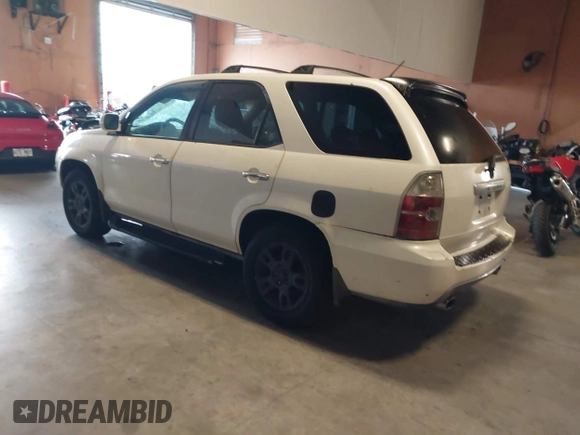 2004 Acura MDX Touring Pkg with VIN 2HNYD18674H537983, listed as a IAAI auction lot 41390364 with 247,823 mi miles. Bid and sale history available at carsss.com. Image 3.