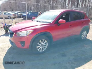 2014 Mazda CX-5 Touring with VIN JM3KE2CY2E0374440, listed as a IAAI auction lot 41634144 with 106,145 mi miles and . Bid and sale history available at DreamBid. Image 23.