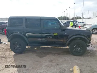 2023 Ford Bronco z VIN 1FMDE5BHOPLB83665, wystawiony jako IAAI lot #41520897 z przebiegiem 16 678 mil mil oraz . Historia ofert i sprzedaży dostępna na DreamBid. Obrazek 14.