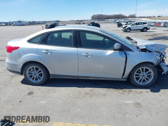 2018 Ford Focus SE with VIN 1FADP3F23JL315341, listed as a IAAI auction lot 41834939 with 121,686 mi miles. Bid and sale history available at carsss.com. Image 13.