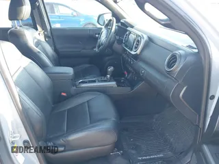 2018 Toyota Tacoma SR5 with VIN 3TMDZ5BN3JM054548, listed as a IAAI auction lot 42038480 with 122,242 mi miles and . Bid and sale history available at DreamBid. Image 5.