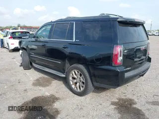 2015 GMC Yukon SLT with VIN 1GKS1BKC1FR539194, listed as a IAAI auction lot 41864424 with 1 mi miles. Bid and sale history available at carsss.com. Image 3.