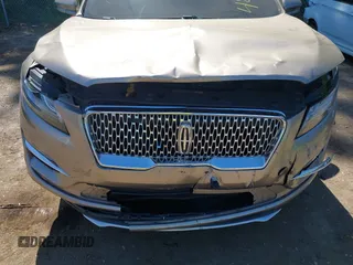 2019 Lincoln MKC Reserve with VIN 5LMCJ3D93KUL53163, listed as a IAAI auction lot 42097105 with 71,066 mi miles and . Bid and sale history available at DreamBid. Image 6.