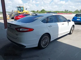 2013 Ford Fusion Titanium with VIN 3FA6P0K92DR184841, listed as a IAAI auction lot 42196408 with 250,718 mi miles and . Bid and sale history available at DreamBid. Image 4.