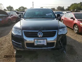 2010 Volkswagen Touareg VR6 with VIN WVGBF7A9XAD001790, listed as a Copart auction lot 70806534 with 90,103 mi miles and Salvage Title. Bid and sale history available at DreamBid. Image 5.