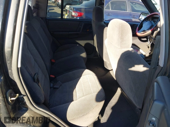 1998 Jeep Grand Cherokee Laredo with VIN 1J4FX58S8WC121904, listed as a IAAI auction lot 41145207 with 222,134 mi miles. Bid and sale history available at carsss.com. Image 8.