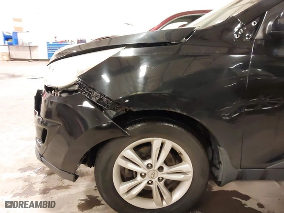 2013 Hyundai Tucson GLS with VIN KM8JU3AC0DU754948, listed as a IAAI auction lot 41811891 with 139,056 mi miles. Bid and sale history available at carsss.com. Image 20.