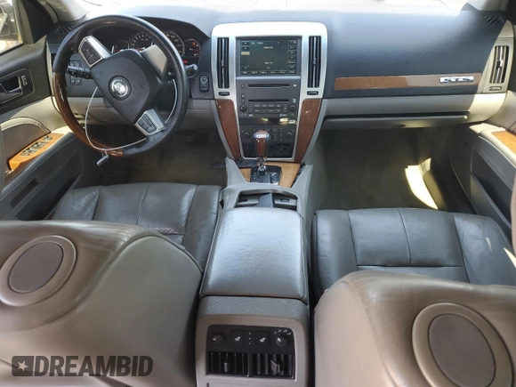 2008 Cadillac STS RWD z VIN 1G6DZ67A280200465, wystawiony jako Copart lot #47092925 z przebiegiem 168 588 mil mil oraz Szkoda całkowita • Salvage title. Historia ofert i sprzedaży dostępna na DreamBid. Obrazek 8.