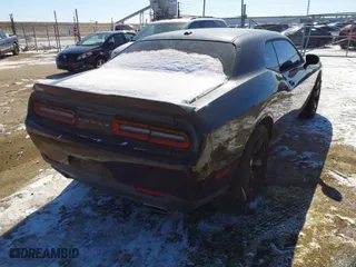 2015 Dodge Challenger SXT with VIN 2C3CDZAG3FH739860, listed as a IAAI auction lot 41633204 with 87,442 mi miles. Bid and sale history available at carsss.com. Image 4.