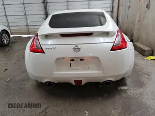 2013 Nissan 370Z Touring z VIN JN1AZ4EH5DM383466, wystawiony jako Copart lot #85704054 z przebiegiem 37 892 mil mil oraz Szkoda całkowita • Salvage title. Historia ofert i sprzedaży dostępna na DreamBid. Obrazek 6.