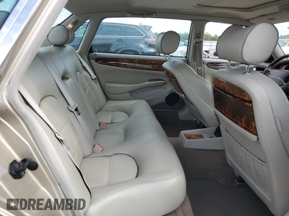 1999 Jaguar XJ z VIN SAJKX6048XC849376, wystawiony jako Copart lot #70538064 z przebiegiem 122 891 mil mil oraz Szkoda całkowita • Salvage title. Historia ofert i sprzedaży dostępna na DreamBid. Obrazek 10.