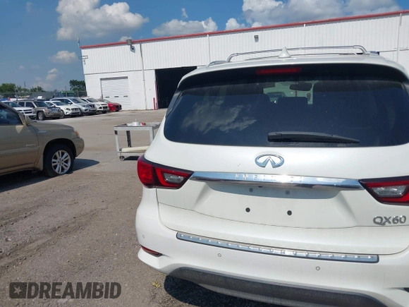 2019 Infiniti QX60 Pure with VIN 5N1DL0MN6KC508551, listed as a IAAI auction lot 42577741 with 130,937 mi miles and . Bid and sale history available at DreamBid. Image 15.