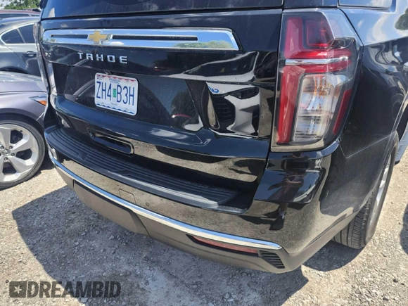 2023 Chevrolet Tahoe LS with VIN 1GNSKMKD8PR221675, listed as a IAAI auction lot 42796201 with 52,002 mi miles and . Bid and sale history available at DreamBid. Image 1.