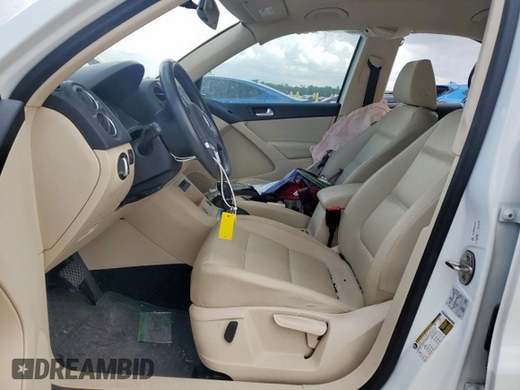 2017 Volkswagen Tiguan S with VIN WVGAV7AX4HW509023, listed as a Copart auction lot 63181405 with 114,006 mi miles and Salvage title. Bid and sale history available at DreamBid. Image 7.