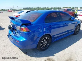 2017 Mitsubishi Lancer ES with VIN JA32U2FU3HU007384, listed as a IAAI auction lot 41875124 with 114,819 mi miles. Bid and sale history available at carsss.com. Image 4.