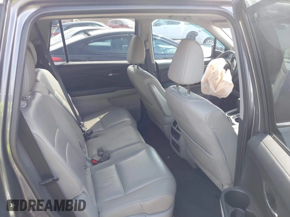 2017 Honda Pilot EX-L with VIN 5FNYF6H5XHB009029, listed as a IAAI auction lot 41883366 with 95,711 mi miles and . Bid and sale history available at DreamBid. Image 8.