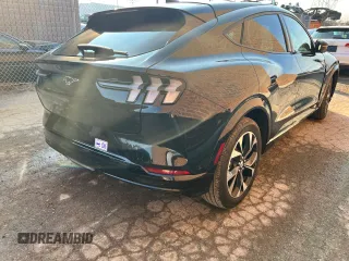 2021 Ford Mustang Mach-E Premium z VIN 3FMTK3SU0MMA43521, wystawiony jako Copart lot #69157472 z przebiegiem 1 659 mil mil oraz . Historia ofert i sprzedaży dostępna na DreamBid. Obrazek 3.