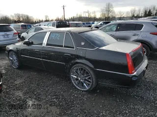 2006 Cadillac DTS 1SD z VIN 1G6KD57Y16U140102, wystawiony jako Copart lot #46145435 z przebiegiem 95 567 mil mil oraz Szkody całkowita. Historia ofert i sprzedaży dostępna na DreamBid. Obrazek 2.