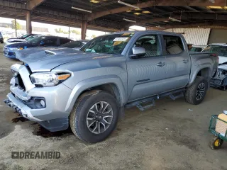 2021 Toyota Tacoma SR with VIN 3TMCZ5AN6MM393306, listed as a Copart auction lot 41483325 with 57,217 mi miles and Salvage title. Bid and sale history available at DreamBid. Image 1.