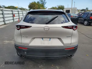 2024 Mazda CX-30 S Premium with VIN 3MVDMBDM6RM653469, listed as a Copart auction lot 47192475 with 9,854 mi miles and Salvage title. Bid and sale history available at DreamBid. Image 6.