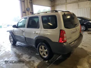 2006 Mazda Tribute i with VIN 4F2YZ02Z86KM02172, listed as a Copart auction lot 73214254 with 317,446 mi miles and Salvage Title. Bid and sale history available at carsss.com. Image 2.