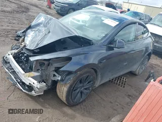 2025 Tesla Model Y Long Range with VIN 7SAYGDED3SF229605, listed as a IAAI auction lot 41726254 with Not Provided miles and . Bid and sale history available at DreamBid. Image 2.