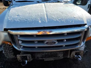 2000 Ford F-350 XL with VIN 1FTSW31F8YEA82117, listed as a Copart auction lot 82800154 with 236,161 mi miles and Salvage Title. Bid and sale history available at DreamBid. Image 11.