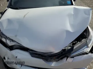 2019 Toyota C-HR XLE with VIN JTNKHMBX5K1057113, listed as a Copart auction lot 47771055 with 84,245 mi miles and Salvage Title. Bid and sale history available at DreamBid. Image 13.