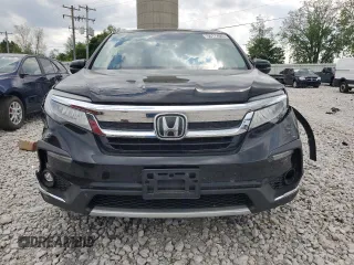 2019 Honda Pilot Touring 8-Passenger z VIN 5FNYF6H99KB005676, wystawiony jako Copart lot #56172085 z przebiegiem 117 274 mil mil oraz Czysty tytuł • Clean title. Historia ofert i sprzedaży dostępna na DreamBid. Obrazek 5.