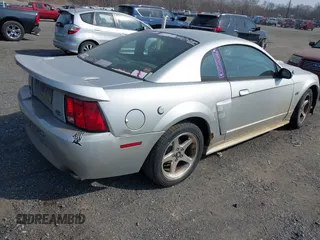 2001 Ford Mustang GT Deluxe with VIN 1FAFP42X61F258356, listed as a IAAI auction lot 41809616 with 197,814 mi miles. Bid and sale history available at carsss.com. Image 4.