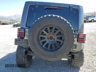 2014 Jeep Wrangler Unlimited Rubicon with VIN 1C4BJWFG8EL188494, listed as a Copart auction lot 46281415 with 171,532 mi miles and Salvage Title. Bid and sale history available at carsss.com. Image 6.