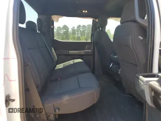 2021 Ford F-150 XL with VIN 1FTFW1E59MFD09567, listed as a Copart auction lot 52706195 with 104,716 mi miles and Salvage Title. Bid and sale history available at carsss.com. Image 10.