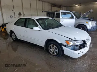 1999 Toyota Camry LE z VIN JT2BG22K3X0317823, wystawiony jako Copart lot #58203965 z przebiegiem 167 587 mil mil oraz Szkoda całkowita • Salvage title. Historia ofert i sprzedaży dostępna na DreamBid. Obrazek 4.