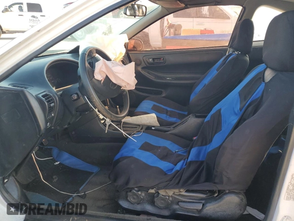 1999 Acura Integra SE with VIN JH4DC4463XS003082, listed as a Copart auction lot 83186044 with 196,255 mi miles and Salvage title. Bid and sale history available at DreamBid. Image 7.