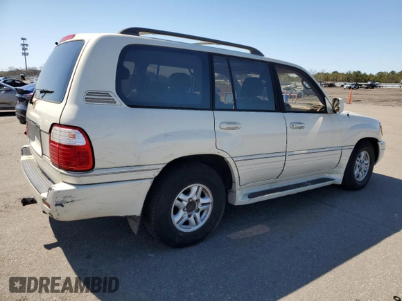 2000 Lexus LX 470 z VIN JT6HT00W1Y0096061, wystawiony jako Copart lot #52499155 z przebiegiem 199 914 mil mil oraz Tytuł czysty. Historia ofert i sprzedaży dostępna na DreamBid. Obrazek 3.