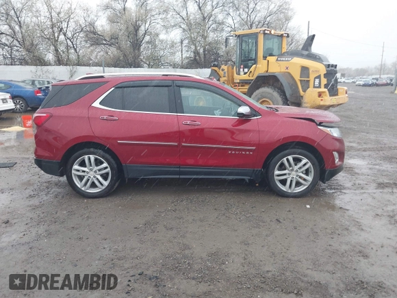 2018 Chevrolet Equinox Premier with VIN 2GNAXVEVXJ6115268, listed as a IAAI auction lot 40881577 with 61,910 mi miles and . Bid and sale history available at DreamBid. Image 14.