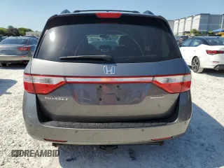 2011 Honda Odyssey Touring with VIN 5FNRL5H97BB501213, listed as a Copart auction lot 57314115 with 283,538 mi miles and Salvage title. Bid and sale history available at DreamBid. Image 6.