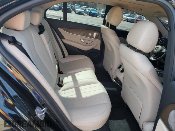2018 Mercedes-Benz E 300 with VIN WDDZF4KBXJA464197, listed as a Copart auction lot 53205215 with 38,002 mi miles and Salvage title. Bid and sale history available at DreamBid. Image 10.