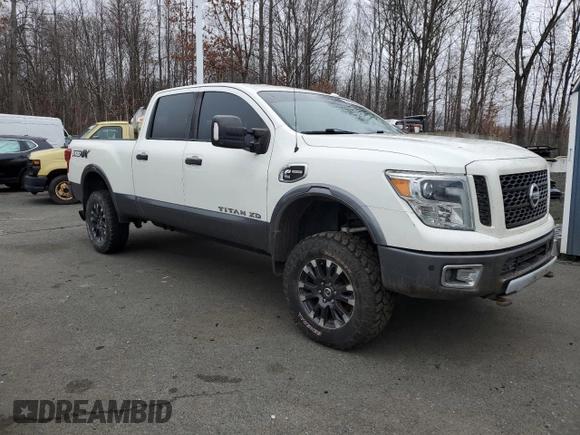 2016 Nissan Titan XD PRO-4X with VIN 1N6BA1F41GN515119, listed as a Copart auction lot 85419494 with 180,435 mi miles and Clean Title. Bid and sale history available at carsss.com. Image 4.