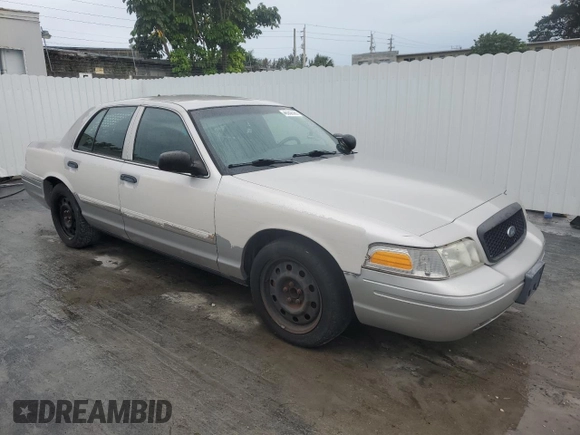 2011 Ford Police Interceptor with VIN 2FABP7BVXBX123711, listed as a Copart auction lot 46352595 with 151,597 mi miles and Clean title. Bid and sale history available at DreamBid. Image 4.