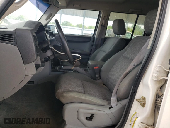 2007 Jeep Commander Sport с VIN 1J8HG48K87C602772, выставлен на аукционе Copart как лот 58578905 с пробегом 230 111 миль миль и Списание • Salvage title. История ставок и продаж доступна на DreamBid. Изображение 7.