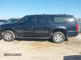 2014 Chevrolet Suburban LT with VIN 1GNSCJE00ER198703, listed as a IAAI auction lot 41952805 with 228,579 mi miles and . Bid and sale history available at DreamBid. Image 14.
