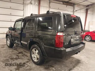2010 Jeep Commander Sport z VIN 1J4RG4GT4AC115611, wystawiony jako IAAI lot #42286985 z przebiegiem 149 365 mil mil oraz . Historia ofert i sprzedaży dostępna na DreamBid. Obrazek 3.