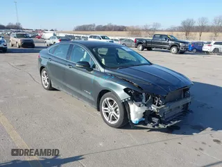 2016 Ford Fusion Titanium Hybrid with VIN 3FA6P0RU6GR156622, listed as a IAAI auction lot 41178887 with 92,423 mi miles. Bid and sale history available at carsss.com. Image 18.