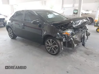 2018 Toyota Corolla L z VIN 5YFBURHE1JP773892, wystawiony jako IAAI lot #42370259 z przebiegiem 125 596 mil mil oraz . Historia ofert i sprzedaży dostępna na DreamBid. Obrazek 1.