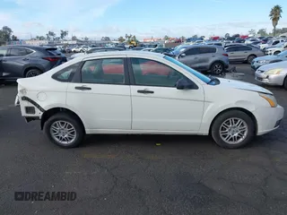 2010 Ford Focus SE with VIN 1FAHP3FN5AW146403, listed as a IAAI auction lot 40955575 with 128,243 mi miles. Bid and sale history available at carsss.com. Image 14.