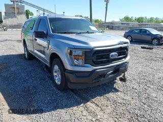 2023 Ford F-150 XL with VIN 1FTNF1E5XPKF47161, listed as a IAAI auction lot 42171620 with 14,623 mi miles and . Bid and sale history available at DreamBid. Image 1.