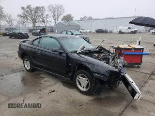 1997 Ford Mustang with VIN 1FALP4049VF136060, listed as a Copart auction lot 85389824 with 0 mi miles and Salvage Title. Bid and sale history available at carsss.com. Image 4.