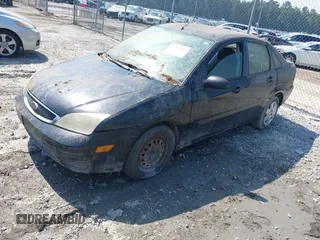 2006 Ford Focus S z VIN 1FAFP34N26W126644, wystawiony jako IAAI lot #42273767 z przebiegiem 245 497 mil mil oraz . Historia ofert i sprzedaży dostępna na DreamBid. Obrazek 2.
