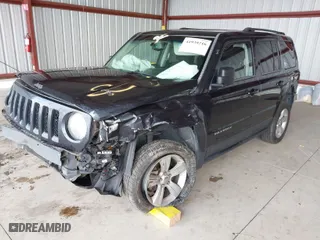 2014 Jeep Patriot Latitude with VIN 1C4NJRFB7ED784130, listed as a IAAI auction lot 41939216 with 141,250 mi miles. Bid and sale history available at carsss.com. Image 2.